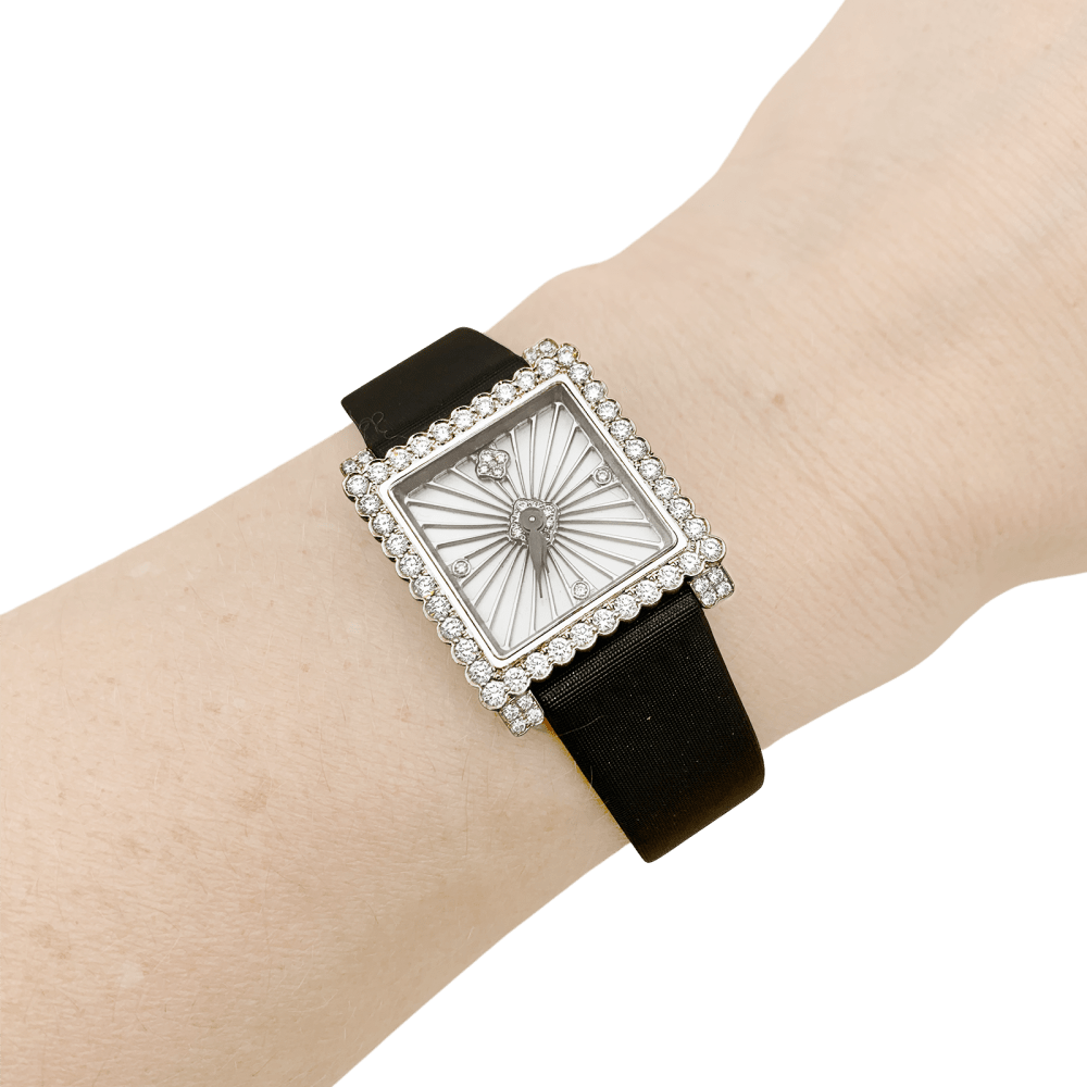 Montre BuccelIati, "Venuschron", or blanc, diamants.   6