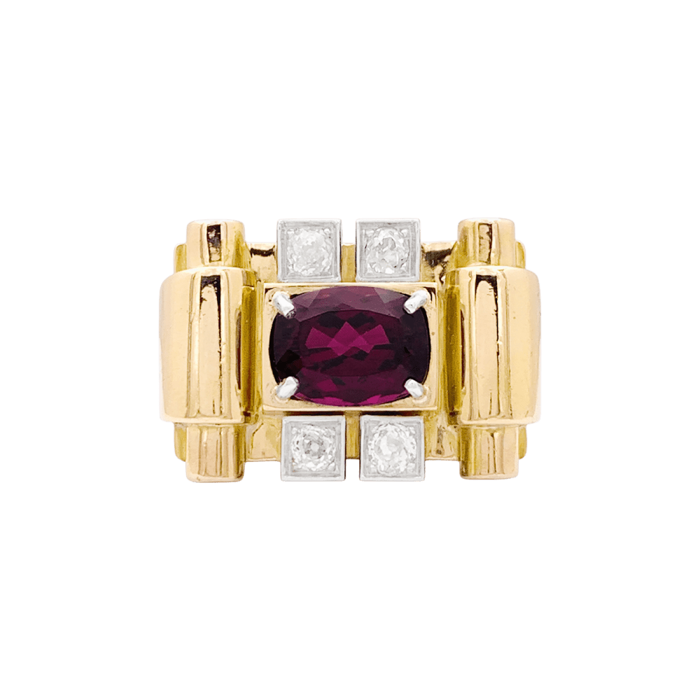 Bague "tank", deux tons d'or, grenat et diamants. 1