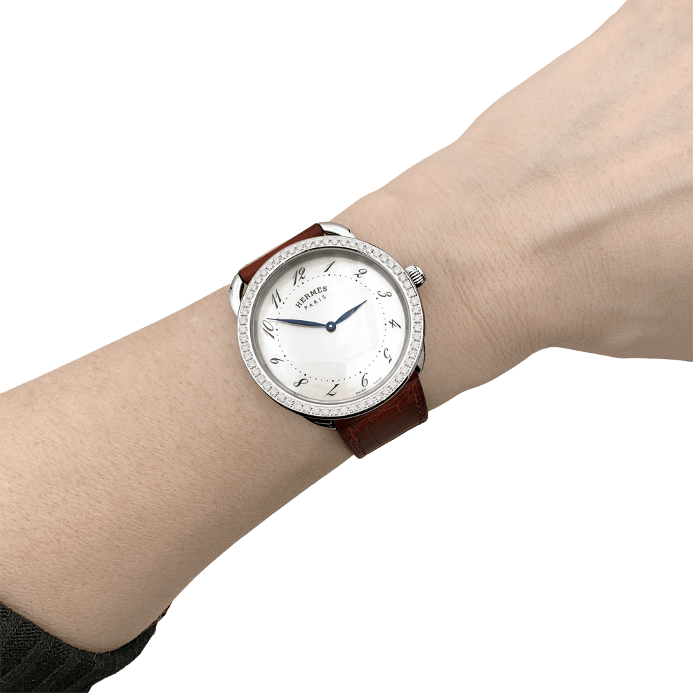 Montre Hermès,"Arceau", acier, diamants.  7