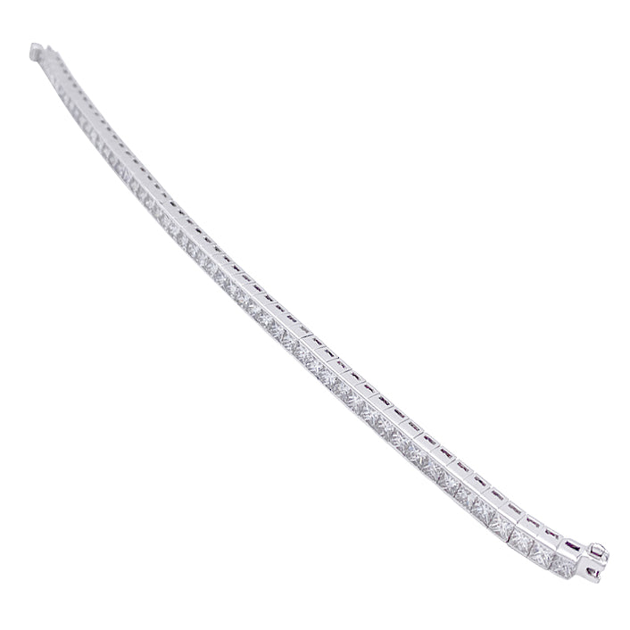 Bracelet ligne or blanc et diamants taille princesse. 7