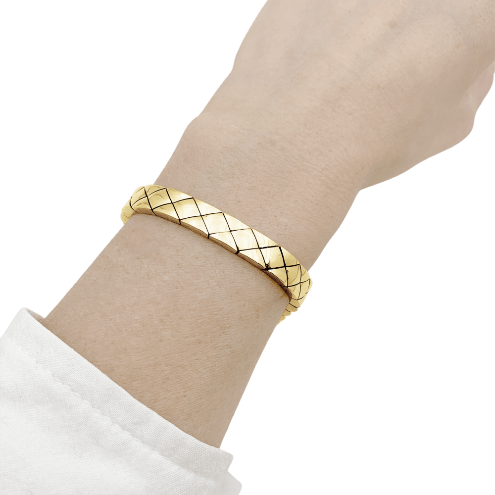 Bracelet Chanel, "Matelassé", or jaune.   5
