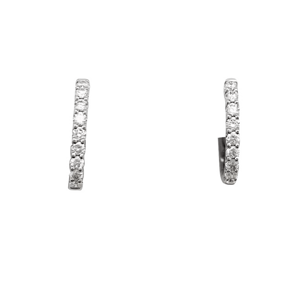 Paire de petites créoles en or blanc, diamants. 2