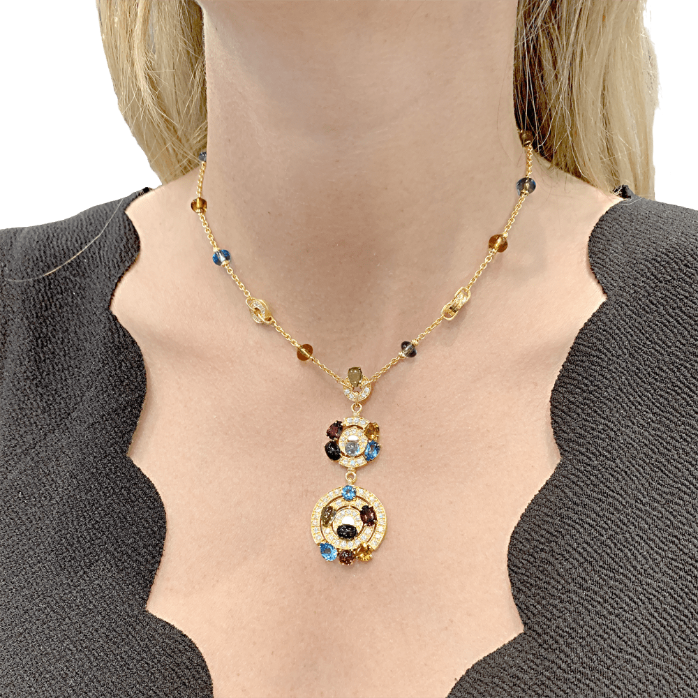 Collier BULGARI "Astrale", or jaune, diamants et pierres de couleur. 7