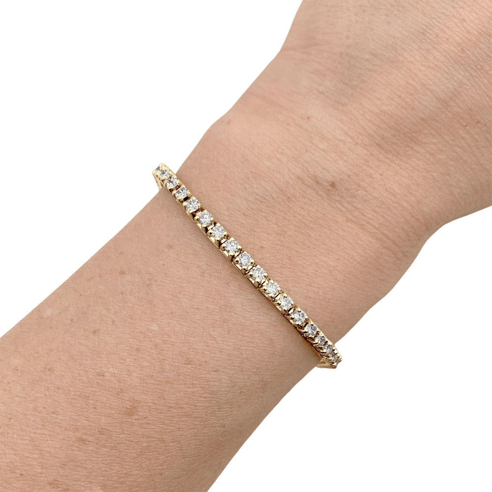 Bracelet ligne or jaune et diamants.  5