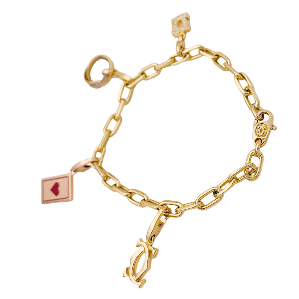 Bracelet Cartier breloques. 3