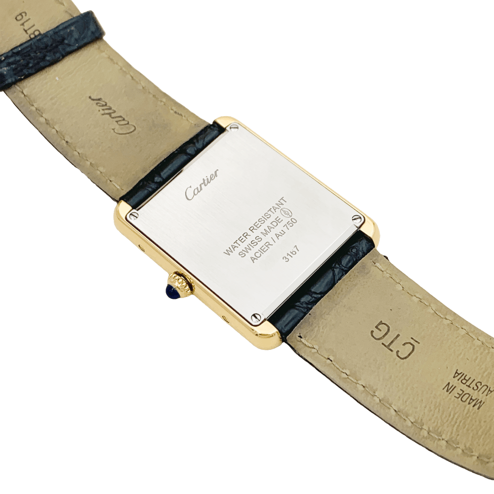 Montre Cartier, "Tank Solo", or jaune et acier.  3