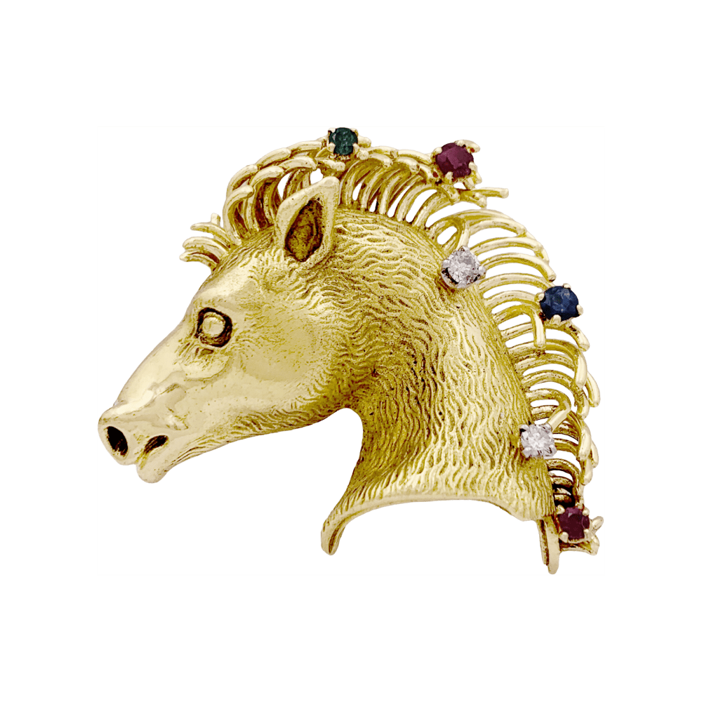 Broche "protomée de cheval", or jaune, diamants, rubis, saphir et émeraude.  1