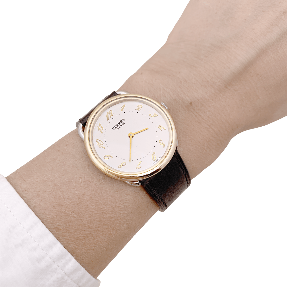 Montre HERMÈS, "Arceau", plaqué or et acier. 5