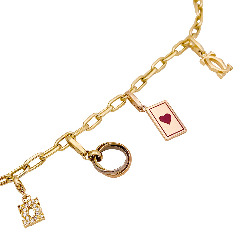 Bracelet Cartier breloques. 4