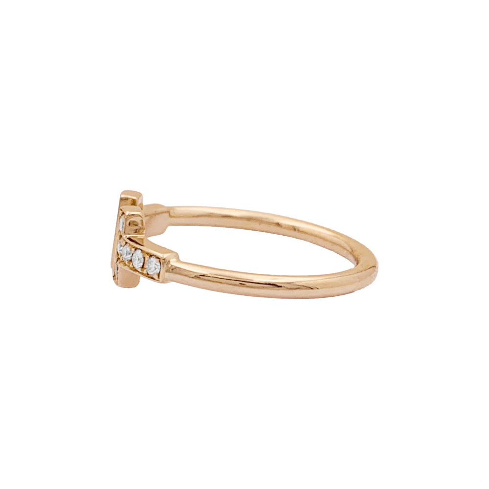 Bague Tiffany & Co, "Wire" collection "Tiffany T" or rose et diamants.  2