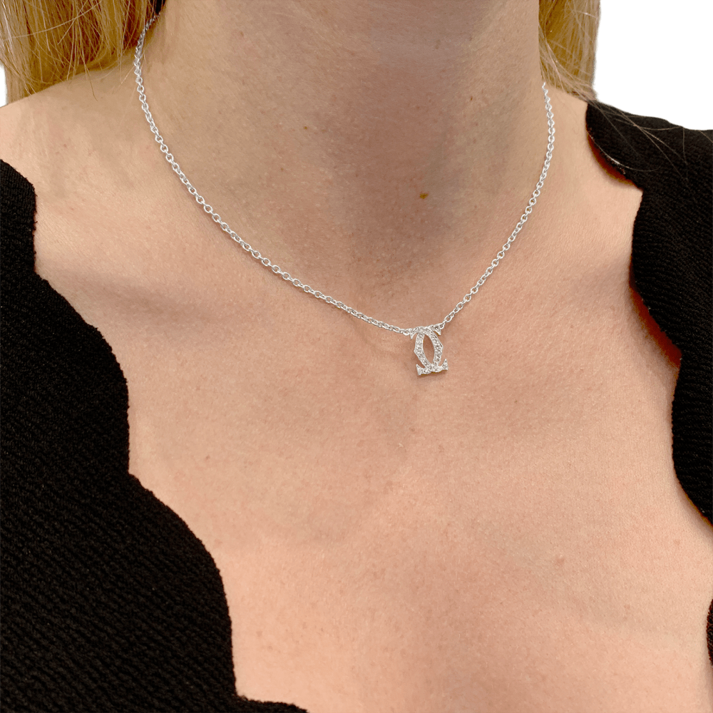 Collier Cartier, "Double C", or blanc et diamants.   6
