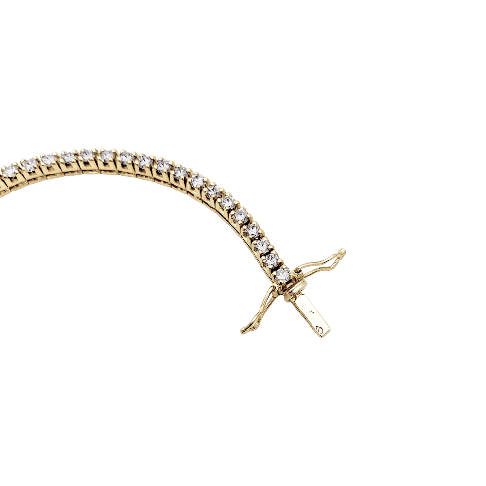 Bracelet ligne or jaune et diamants.  3