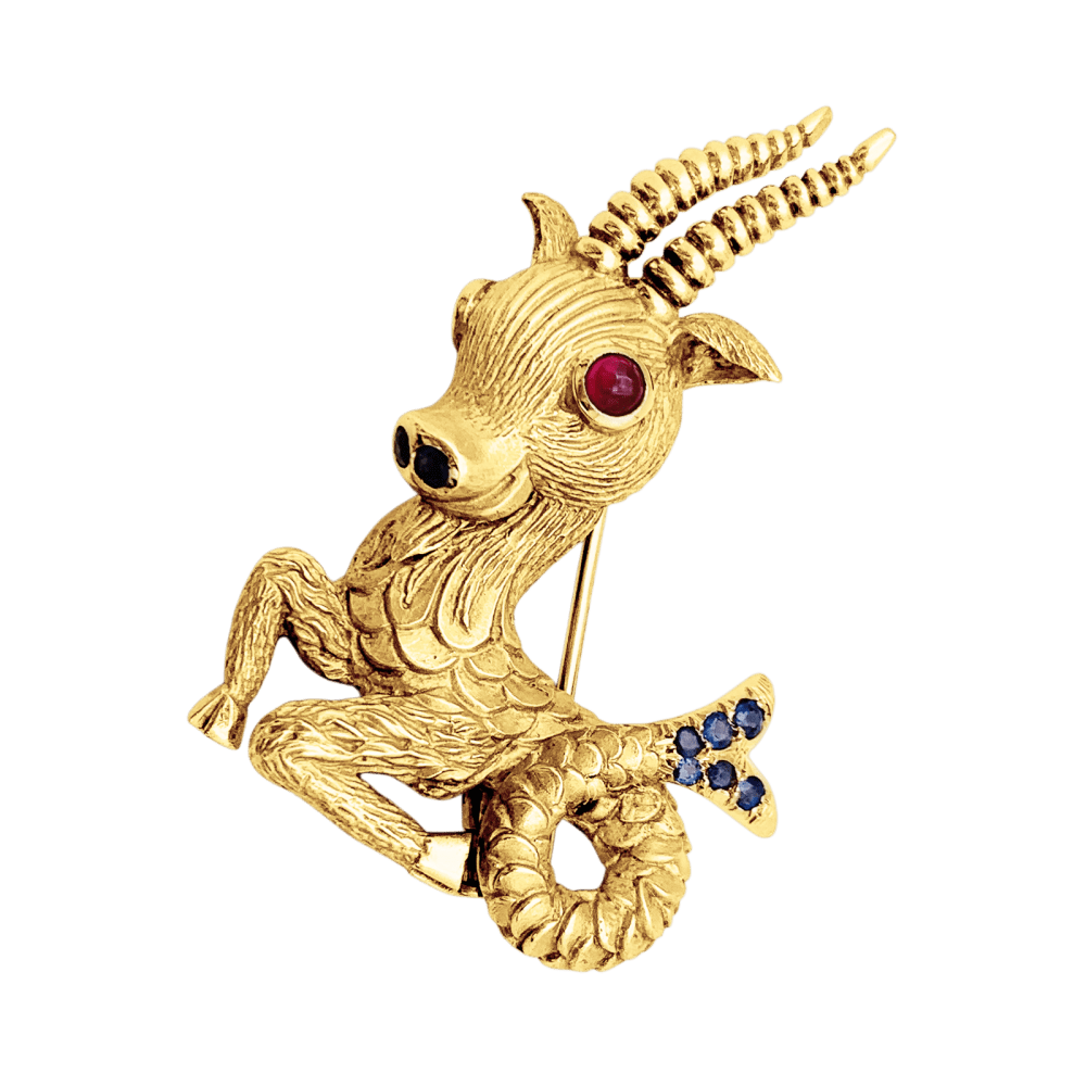 Broche-clip, "Capricorne", or jaune, rubis, saphirs. 2