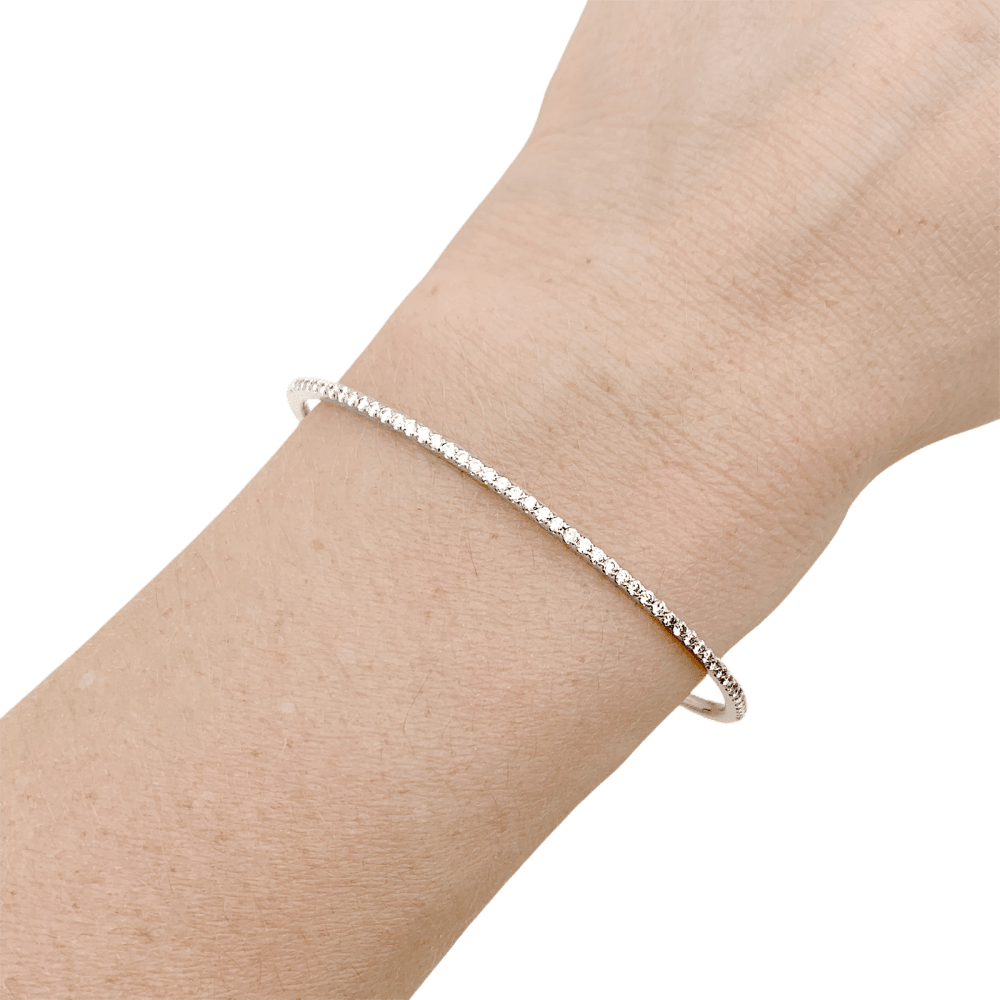 Bracelet jonc or blanc et diamants. 5