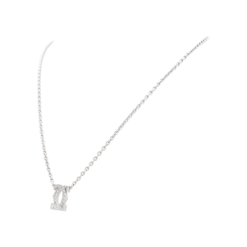 Collier Cartier, "Double C", or blanc et diamants.   2