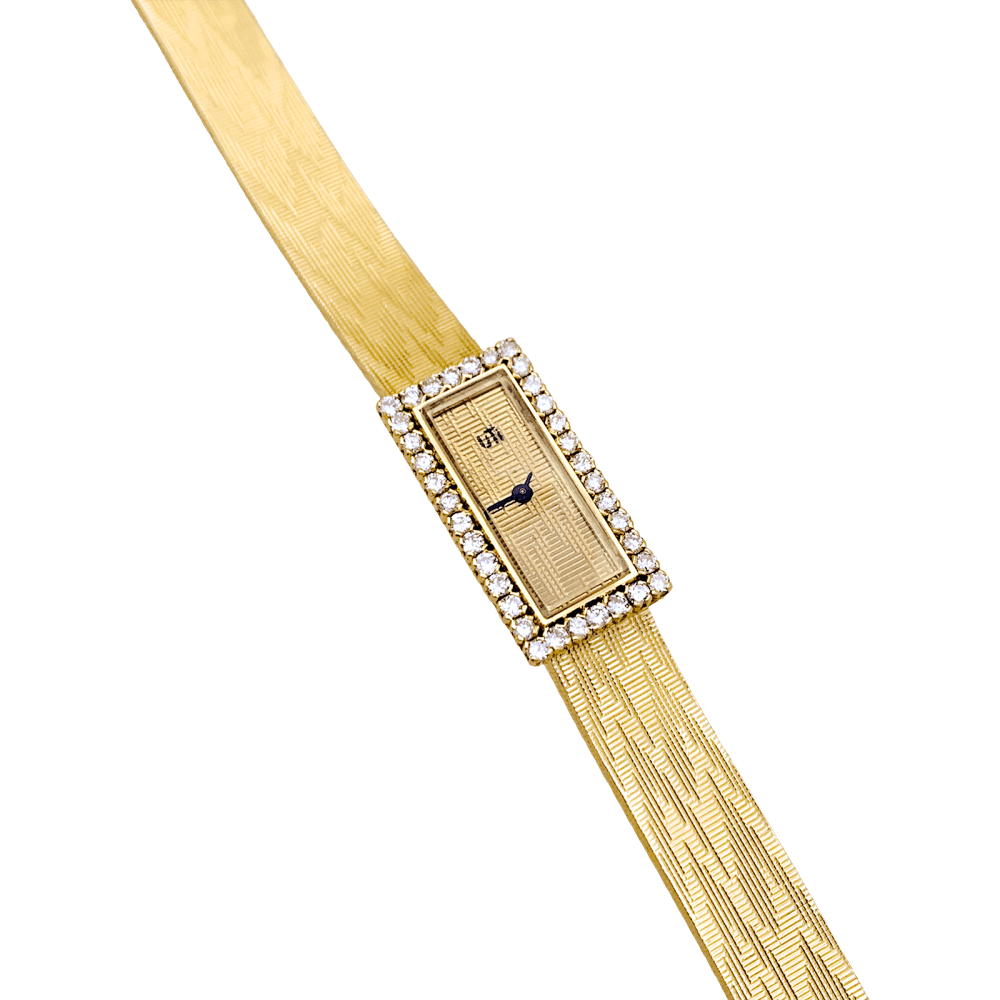 Montre vintage UTI, mouvement Blancpain, or jaune, diamants. 4