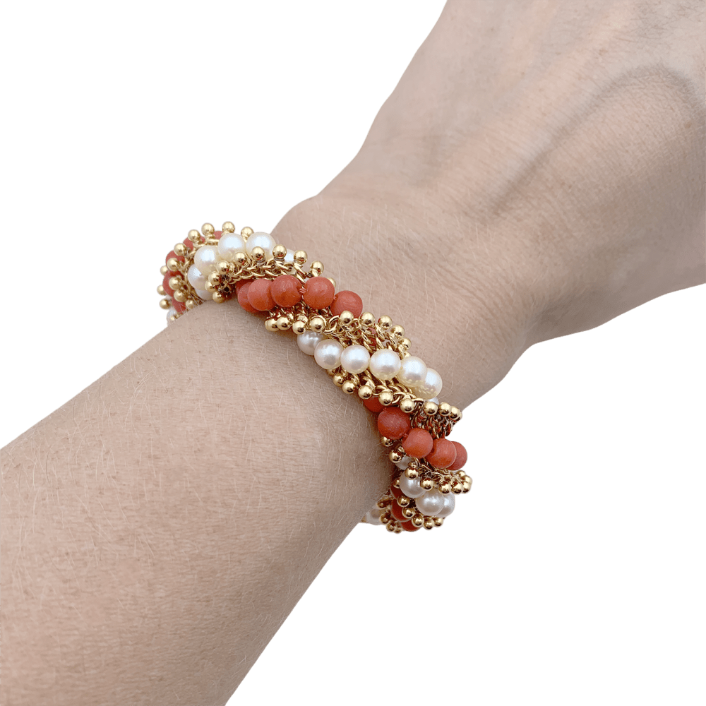 Bracelet Van Cleef & Arpels, "Twist", or jaune, corail, perles. 5
