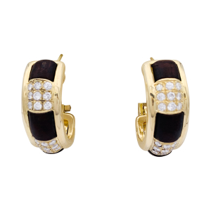 Boucheron gold earrings, "Les Plurielles", wood and diamonds.