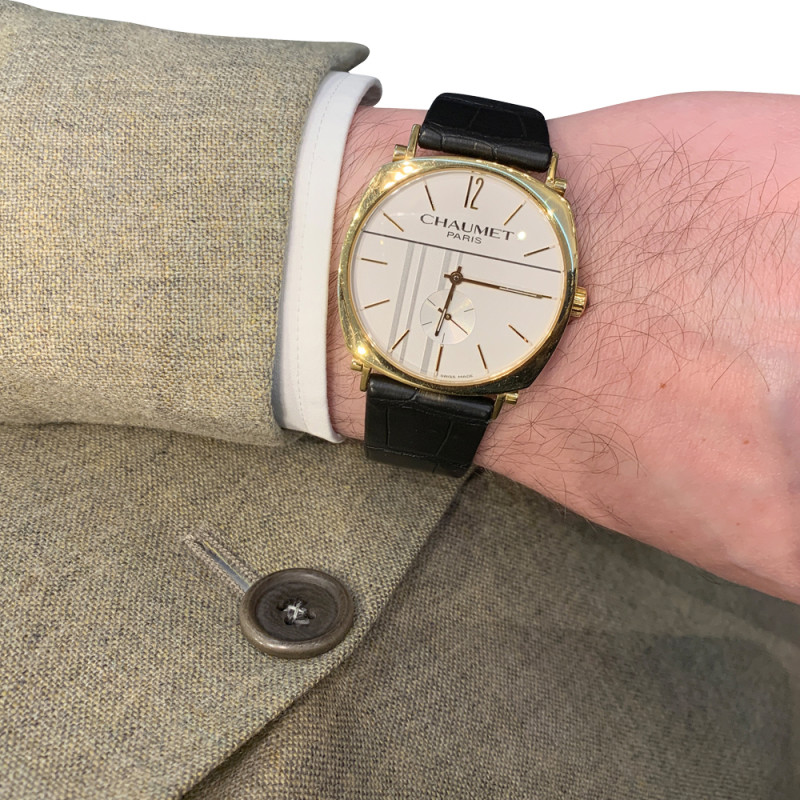 Yellow gold Chaumet watch "Dandy" collection on a leather band.