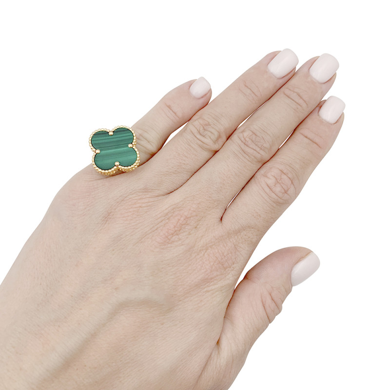 Van Cleef & Arpels gold and malachite ring, "Magic Alhambra" collection.
