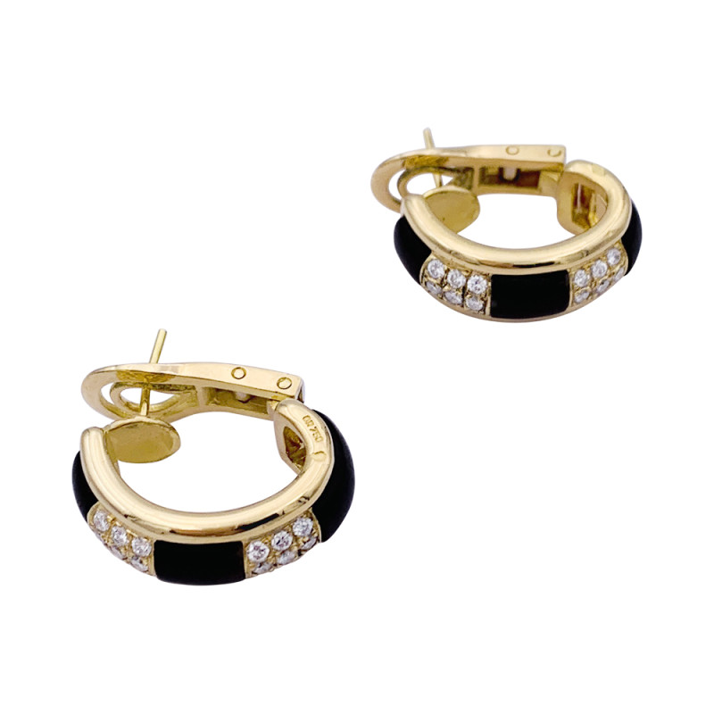 Boucheron gold earrings, "Les Plurielles", wood and diamonds.