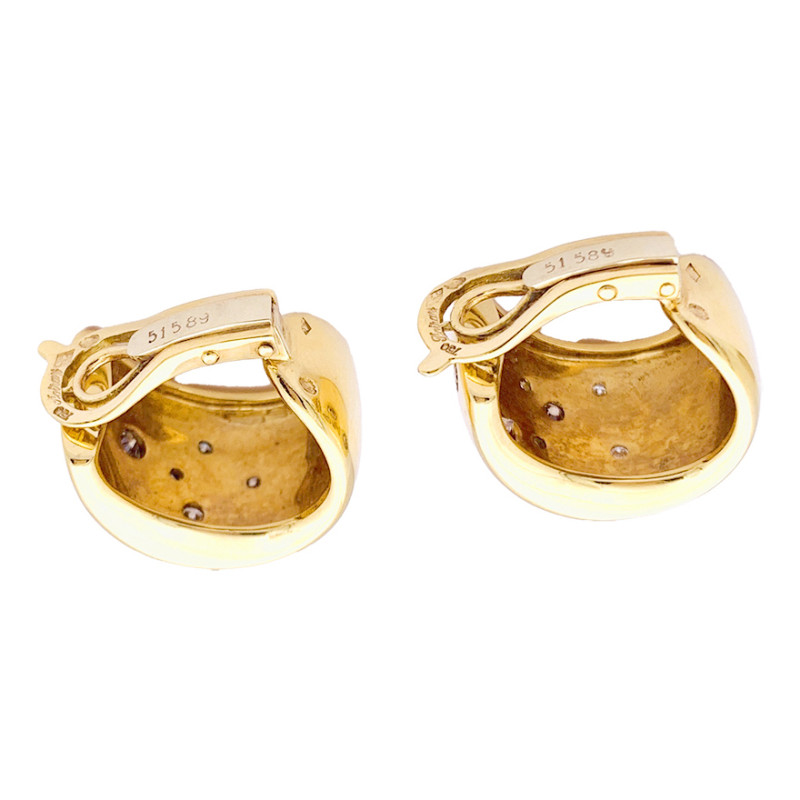 Poiray gold and diamonds earrings.