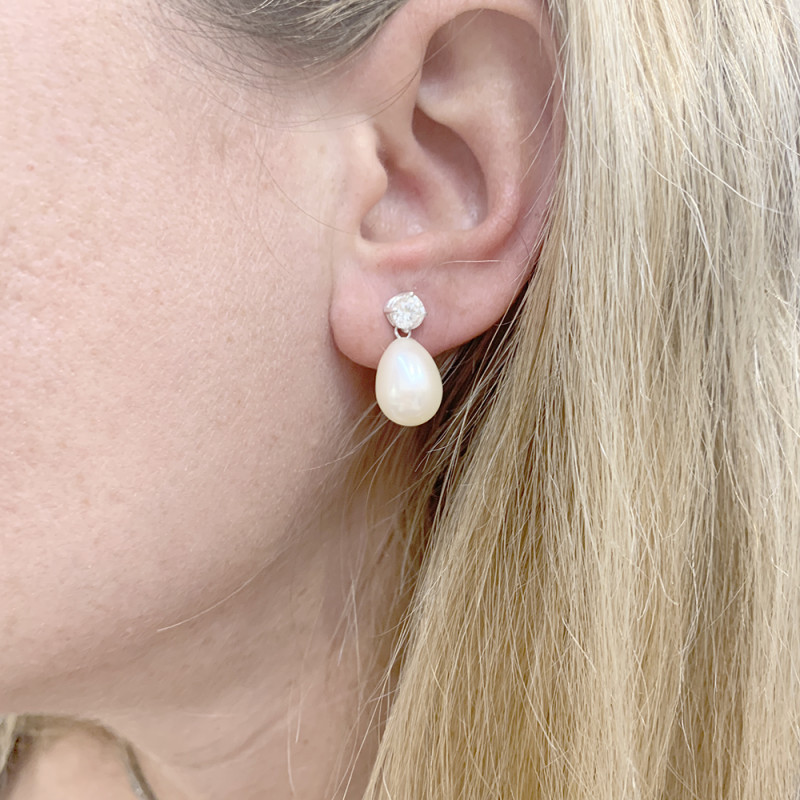 White gold, diamonds and pearls pair of earrings.
