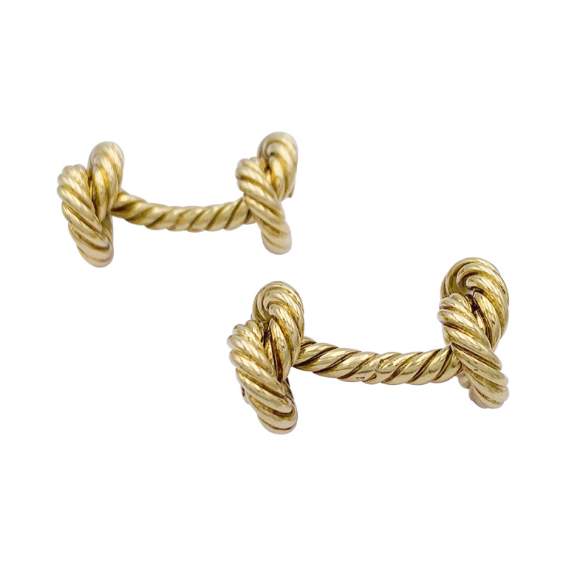 Hermès gold "Knots" cufflinks.
