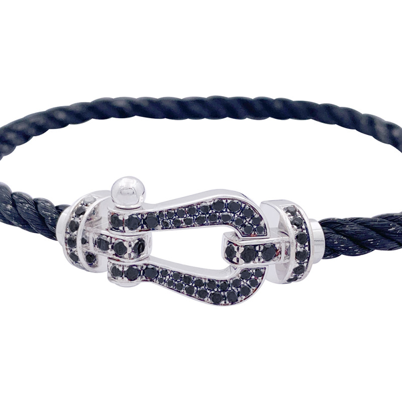 Bracelet Fred, "Force 10", or blanc, acier et diamants noirs.