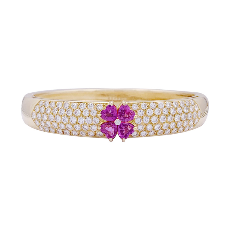 Van Cleef & Arpels yellow gold, diamonds, pink sapphires bangle bracelet.
