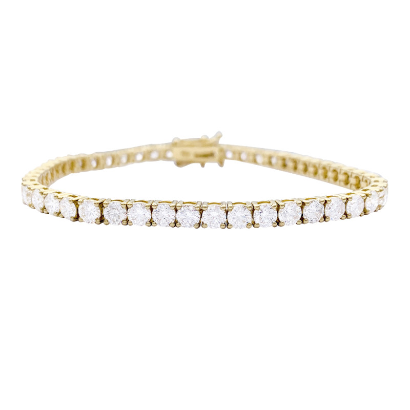 Tennis gold bracelet, diamonds.