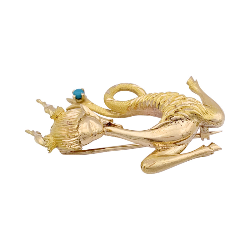 Vintage gold, turquoise "Capricorn" brooch.