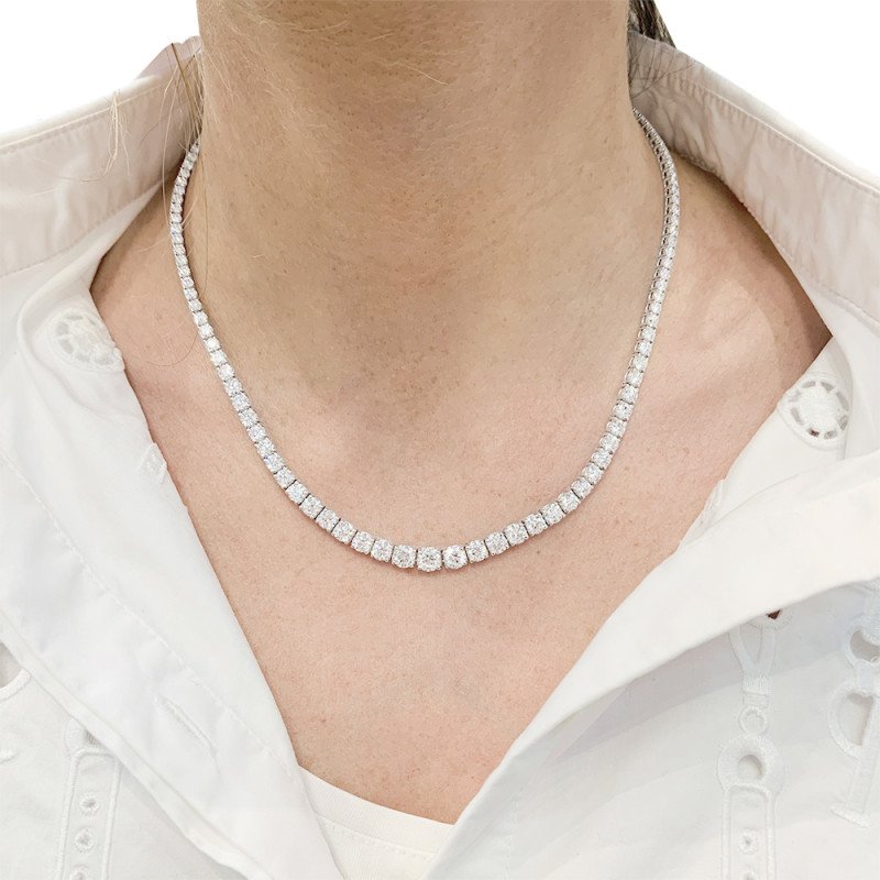White gold diamonds line necklace.