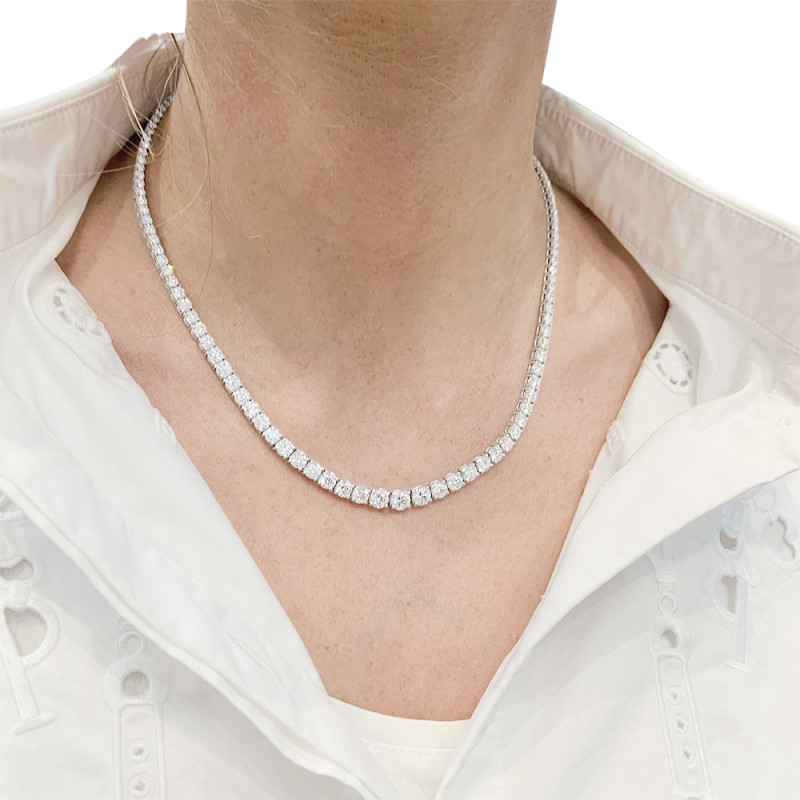 White gold diamonds line necklace.