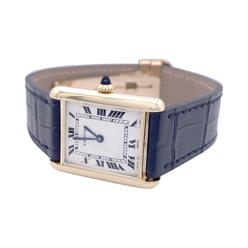 Cartier gold watch, "Tank Louis Cartier" collection.