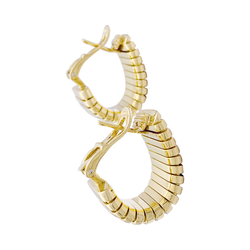 Bulgari gold earrings, "Tubogas" collection.
