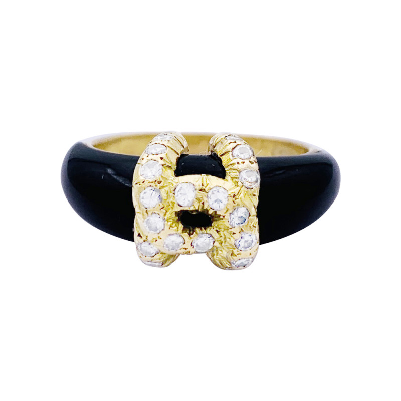 Yellow gold Cartier ring, "Double C" collection, onyx, diamonds.