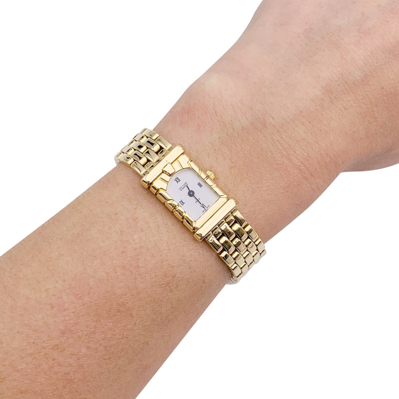 Van Cleef & Arpels gold watch, "Façade" collection.