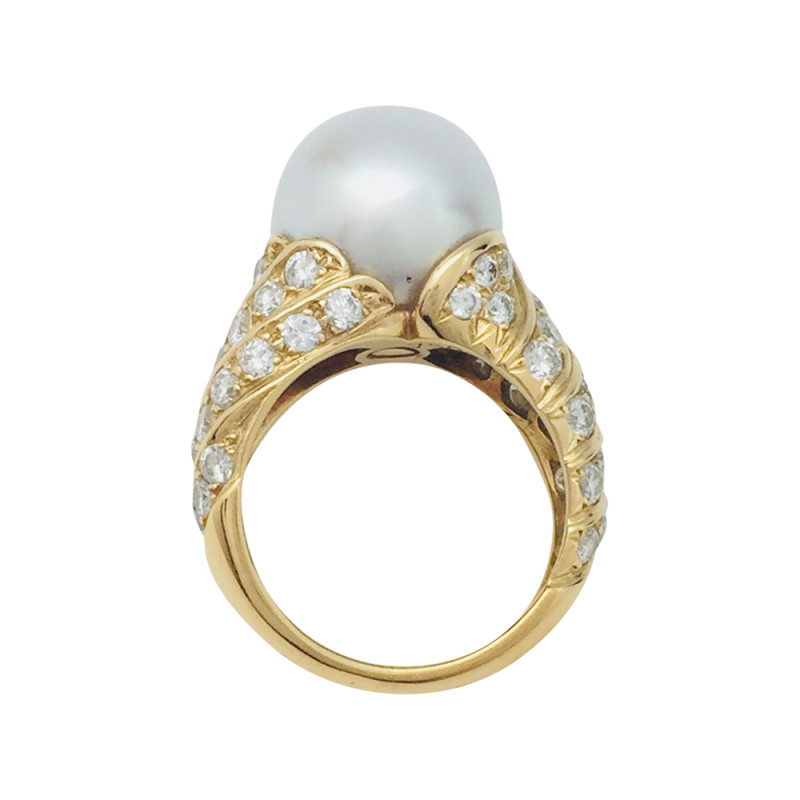 A yellow gold Tabbah ring, white pearl and diamonds.