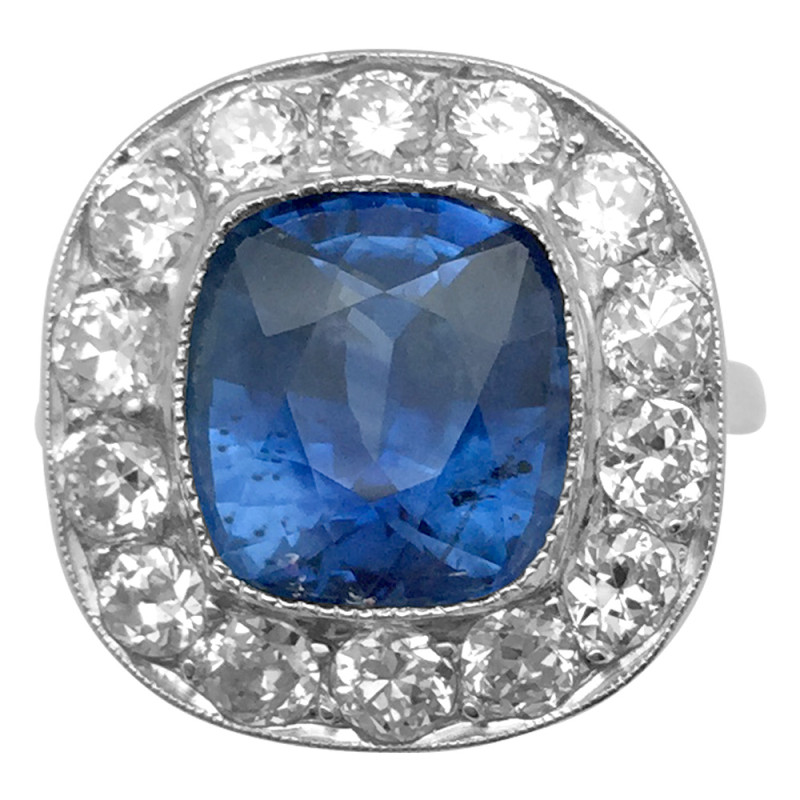 Platinum ring, cushion cut sapphire and diamonds.
