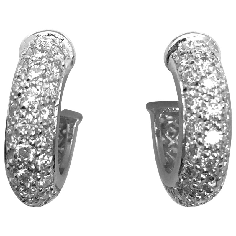 Boucles d'oreilles Cartier, modèle " Etincelle", diamants et platine.