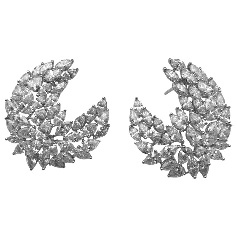 White gold Messika earrings, "Silk croissant" collection with diamonds.