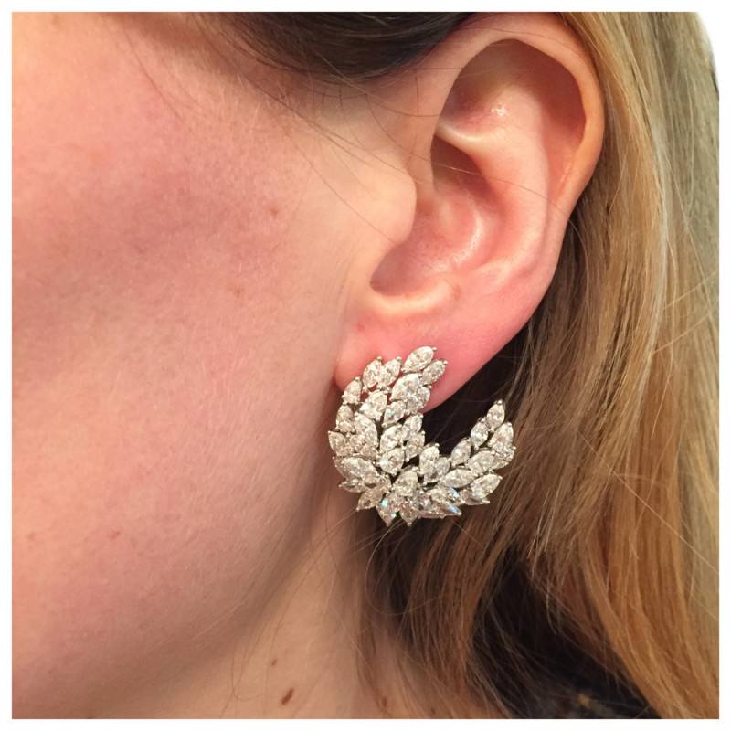 White gold Messika earrings, "Silk croissant" collection with diamonds.