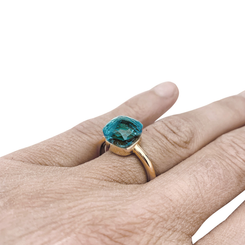Rose gold Pomellato ring "Nudo" collection, blue topaze.
