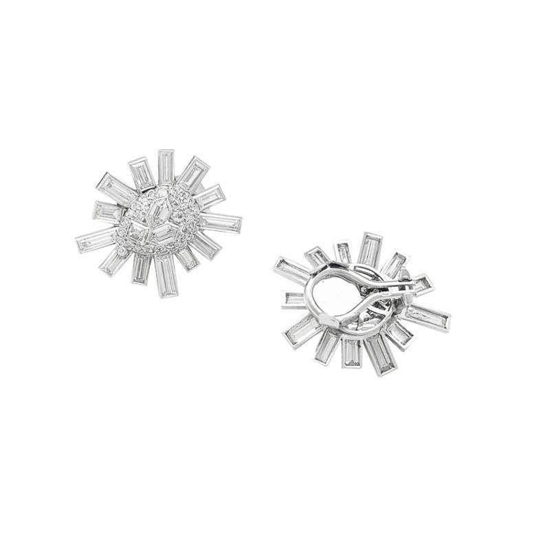 Platinum and white gold snowflakes earrings.