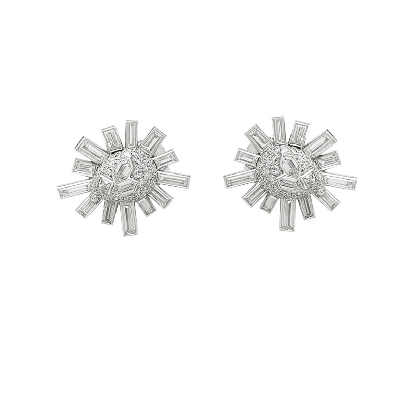 Platinum and white gold snowflakes earrings.
