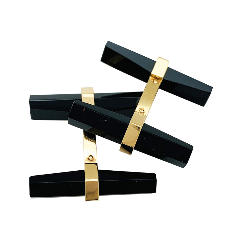 Cartier gold cufflinks, onyx and steel.