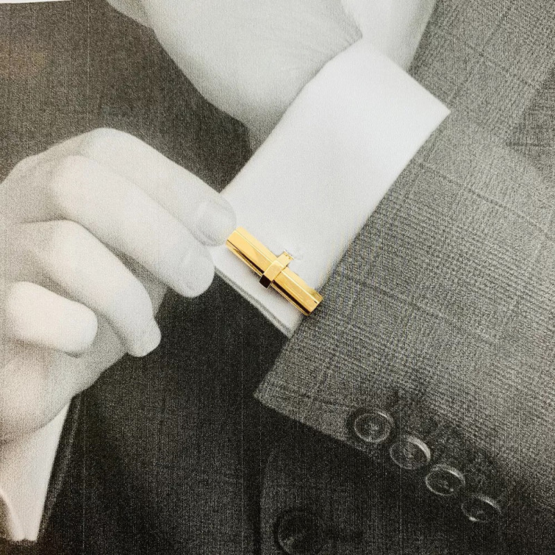 Cartier gold, onyx, steel and aventurine cufflinks.