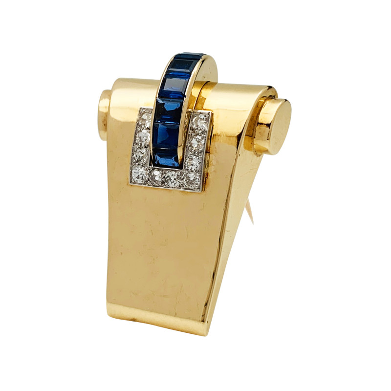Gold and platinum Boucheron clip, diamonds and sapphires.