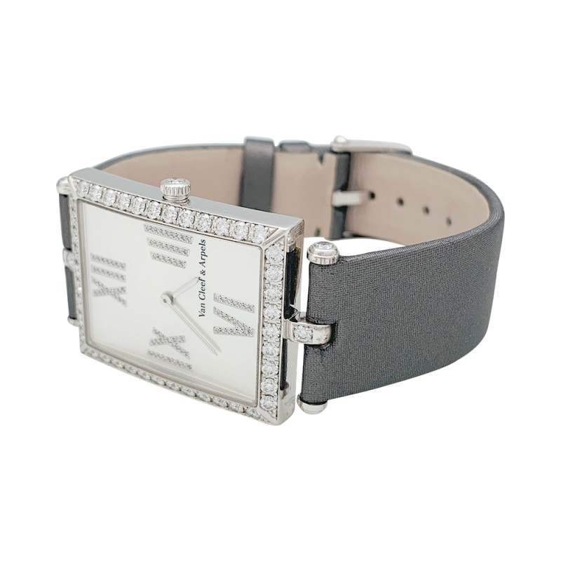 White gold Van Cleef & Arpels "Classique Arpels" watch, diamonds and satin bracelet.